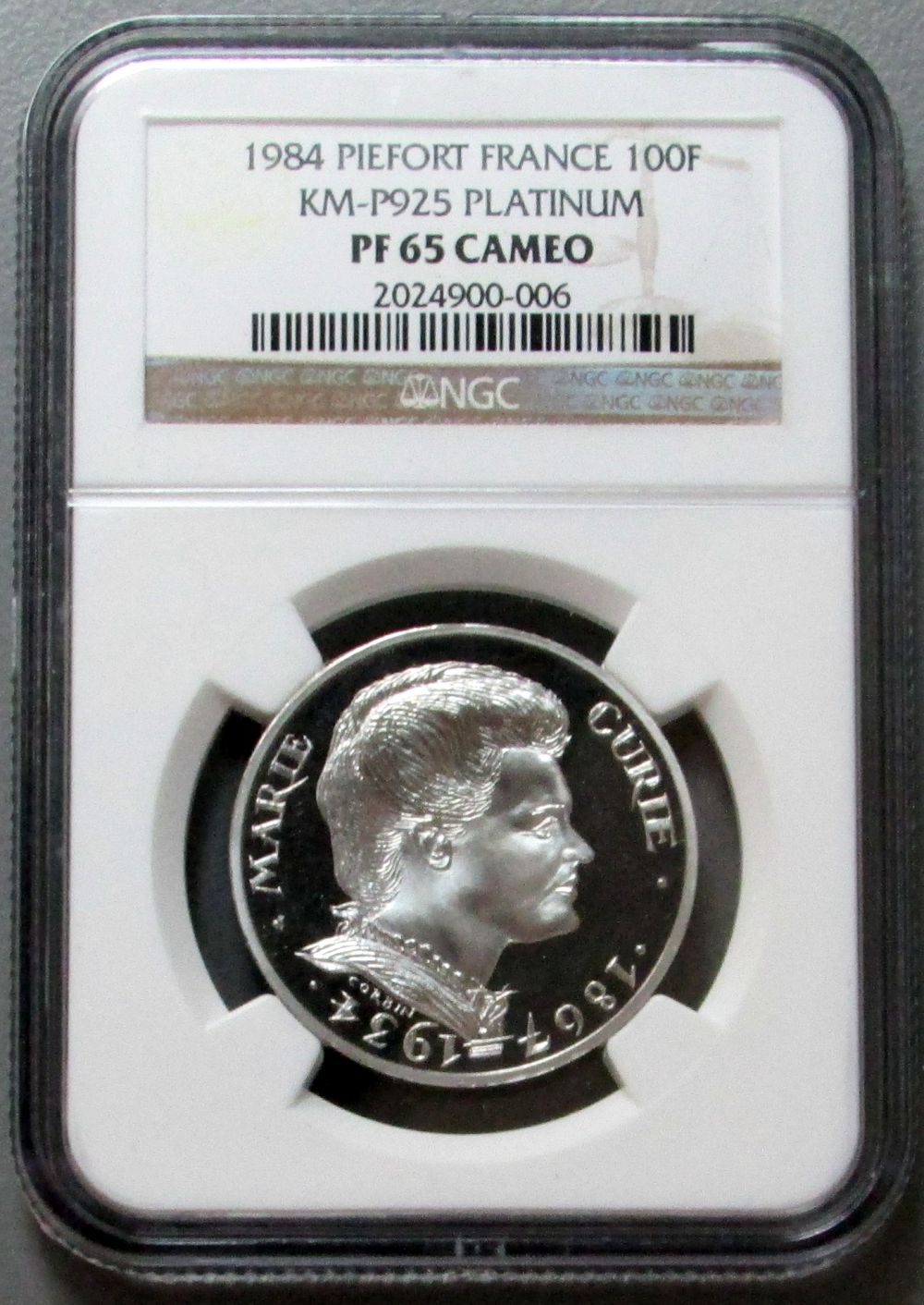  1984 PLATINUM FRANCE 100 FRANCS PIEFORT NGC PROOF 65 CAMEO 50th ANNIVERSARY OF THE DEATH OF MARIA CURIE 1.927 OZS "RARE ONLY 9 MINTED"